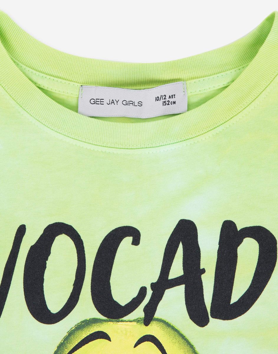 школьница на парте Зеленая футболка superoversize с принтом Avocado party для девочки  GKT017951-1 купить по цене от 299 рублей с доставкой по России